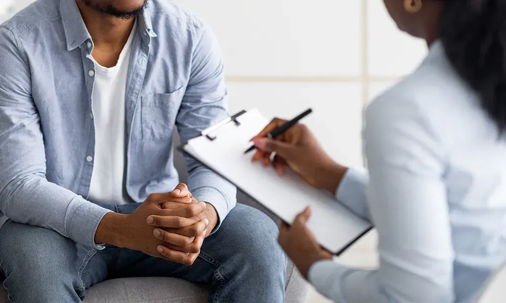Healthcare professional discussing wellness with patient